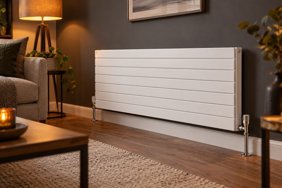 White panel radiator installed in a living room